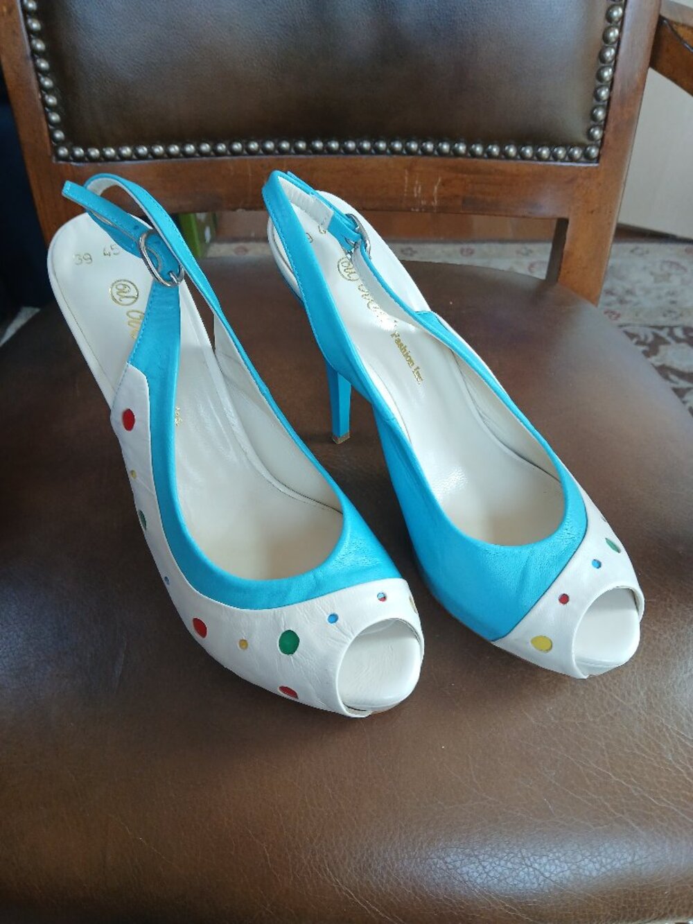 Cute leather pumps in aquamarine . New and Unworn.